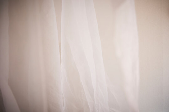 Sheer fabric texture. Translucent. Indoors.