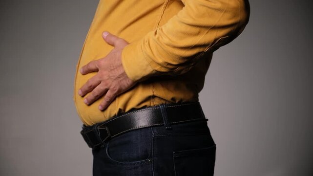 Middle-Aged Man Complaining of Abdominal Bloating