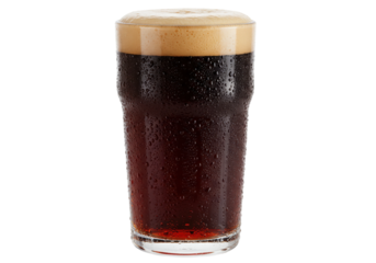 Isolated pint of dark beer with foamy head and water droplets on the glass surface