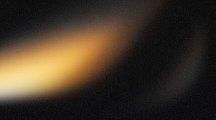 Abstract blurred image showcasing a soft gradient of warm colors against a dark background, creating a sense of depth and visual intrigue for artistic exploration and design