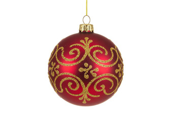 Isolated red Christmas ornament with gold design, hanging holiday decorative bauble