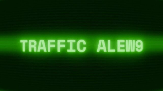 Old green CRT screen showing text TRAFFIC ALERT appearing in random glitch and coding style