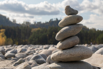 Balanced Stones on Riverbank