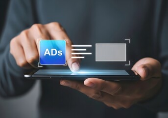 Person using a smartphone with ads icon and a blank rectangle on the screen with fingers visible