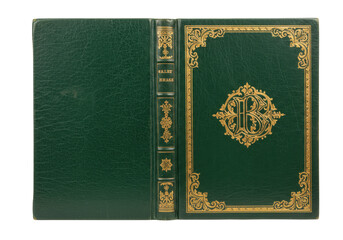 Isolated antique book with a decorated green cover and golden title on the spine edge