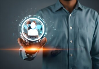 Man interacting with a digital interface showing a person icon and a world map in a circular frame