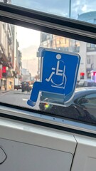 Wheelchair accessible bus seat sign