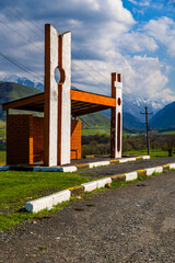 Modern bus shelter in serene rural mountainous Kyrgyzstan area