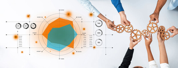 A vibrant image showcasing teamwork with hands holding gears over a data visualization background,...