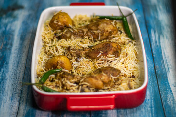Spicy chicken biryani with basmati rice, indian cuisine