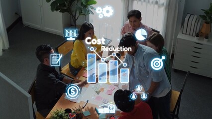 A dynamic team collaborates in a modern office, focusing on cost reduction strategies while utilizing graphical data visualization elements for effective decision-making. Raster