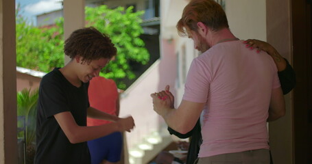 Diverse group of friends and family dancing joyfully at an outdoor gathering, celebrating connection, culture, and shared moments in a vibrant multicultural atmosphere