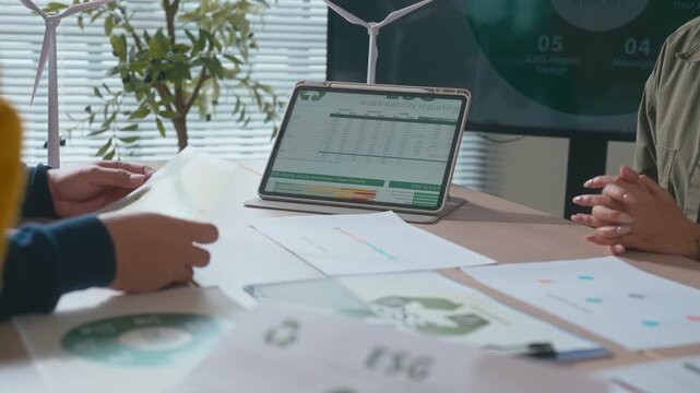 Asian business team online meeting with clients to discuss sustainable business practices focuses on reuse, recycling, and environmental protection to support ESG goals and build a greener future.