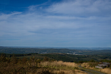Scenic mountain landscape panorama with blue sky horizon