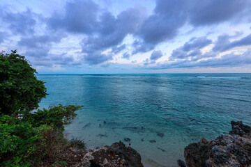 Beautiful ocean view with a cloudy sky in the background