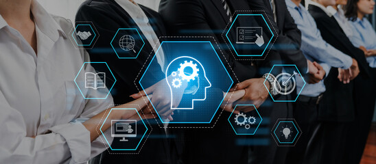 Group of business professionals in formal attire standing in line with digital icons showcasing innovation and technology in a corporate setting, symbolizing growth and collaboration. Trope