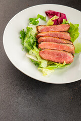 Duck breast roast poultry fresh natural product tasty snack delicious gourmet food background on the table rustic top view copy space