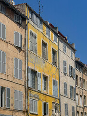 Fototapeta premium Yellow and Pink Architecture of Marseille on a Sunny July Afternoon 