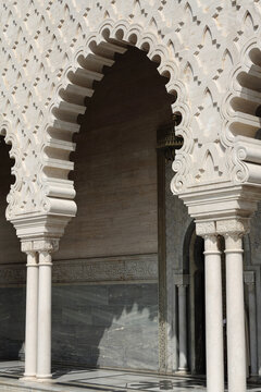 Rabat, Morocco. Intricate white marble Arabesque style arch. Islamic symmetrical symbols.
