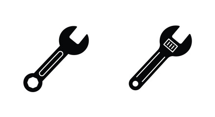 Two black wrench icons displayed on a plain white background