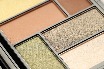 Beautiful eyeshadow palette as background, closeup. Cosmetic product