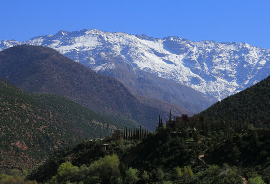Morocco, High Atlas Mountains, Snow covered peaks of Toubkal National Park. Toubkal at 4,167 m it is the highest peak in Morocco, North Africa and the Arab world.