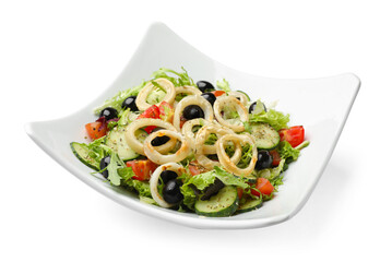 Delicious salad with squid rings, olives and vegetables isolated on white