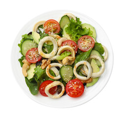 Delicious salad with squid rings, avocado, nuts and vegetables isolated on white, top view