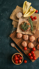 Delicious ingredients for a home-cooked meal arranged on a wooden board.