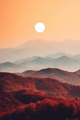 sunset over autumn mountains silhouettes on layers of mountain peaks, sky with red and orange hues, rolling hills covered with colorful forests