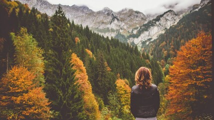 woman in a black jacket on the background of an autumn forest on the mountain background --chaos 35 --ar 16:9 --stylize 50 --v 7 Job ID: a88e9a9f-ed5a-4933-829e-ec4ab1eee286