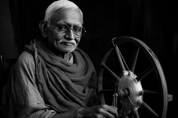 happy elderly man, mahatma gandhi on light background	
