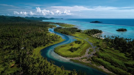 Obraz premium Scenic view of a river flowing into the ocean with lush green vegetation.
