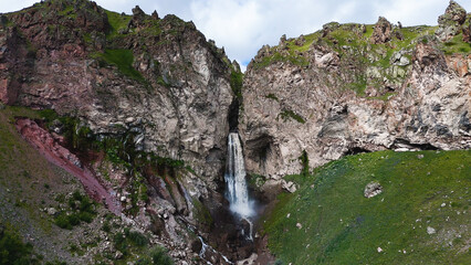 Flying over the Jily-Su Waterfall in the Caucasus in the summer