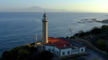 Aerial view of the lighthouse of Punta Carnero, in the province of Cádiz, Andalusia, Spain, close...