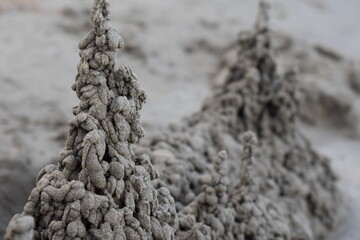 Sand castle made of wet sand