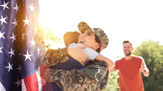 Military woman and her family outdoors, double exposure with national flag of USA. Banner design