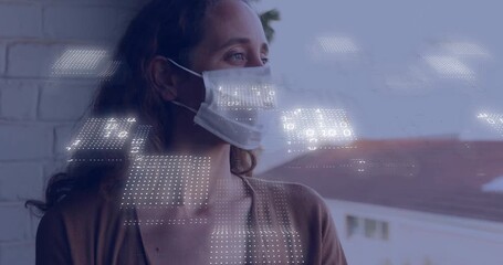 Woman wearing face mask turning toward balcony activating floating data grid for network tracking - Powered by Adobe