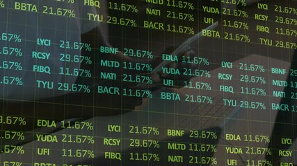 Man in suit tapping smartphone updating finance tickers and portfolio on transparent display