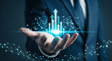 Businessperson hand showing glowing growth arrows