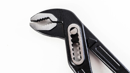 Adjusting pliers on a light background showing the grip and functionality for various tasks. White background