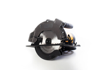 A powerful electric hand-held circular saw isolated on a white background, close-up. Woodworking tool.
