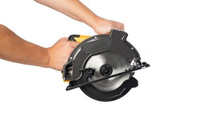 A powerful electric hand-held circular saw in a man's hands, isolated on a white background, close-up. Woodworking tool, industry