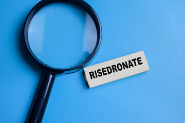 Residronate on stacked wooden cubes on the table. Business and finance concept