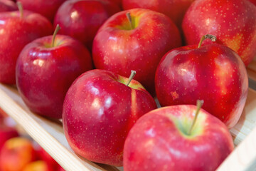 Fresh red apples are on the farmer's market counter