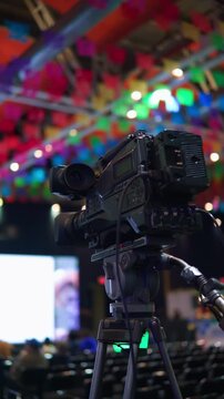 Professional broadcast camera filming a live event