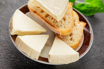 Processed cheese triangle spread portion size cheese for sandwich tasty snack fresh delicious gourmet food background on the table rustic food top view copy space