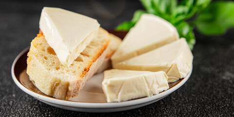 Processed cheese triangle spread portion size cheese for sandwich tasty snack fresh delicious gourmet food background on the table rustic food top view copy space