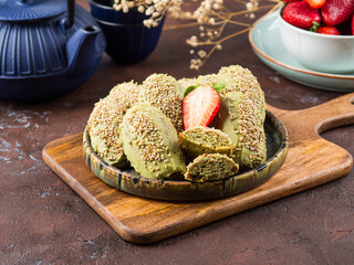 Matcha madeleine cookies with green tea and white chocolate frosting