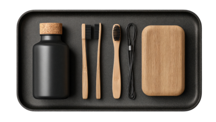 Dark tray holds black bottle, wooden toothbrushes, and case